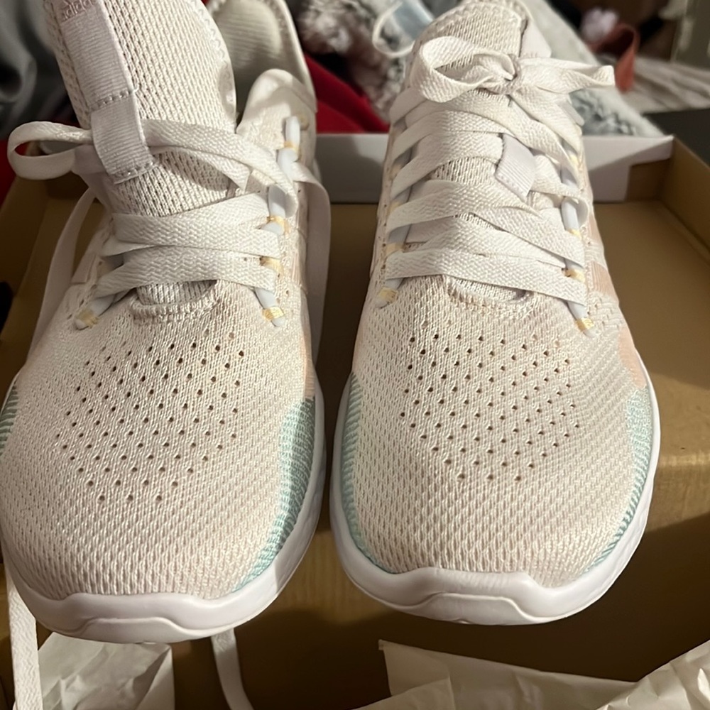 BRAND NEW Adidas sneakers.